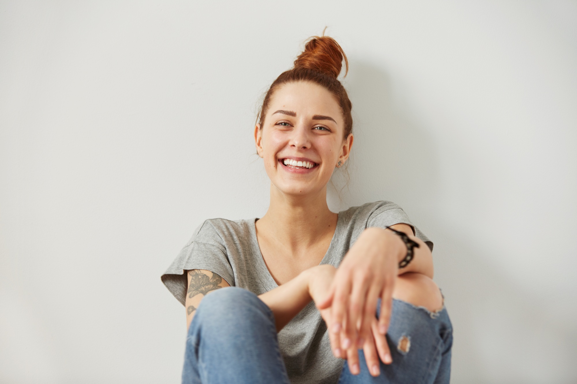 Woman laughing. Closeup portrait woman smiling with perfect smile and white teeth looking laugh loud